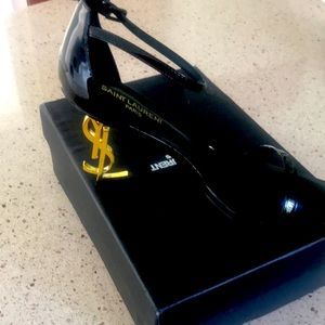 Saint Laurent Black And Gold Heel logo